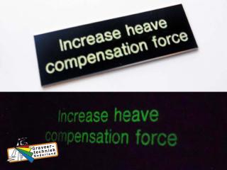 Plaatjes met fluoriserende verf. Gravure overdag zichtbaar en tijdelijk in het donker (kleur verf is licht geel)